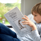 Child Holding Personalized Velveteen Rabbit Book
